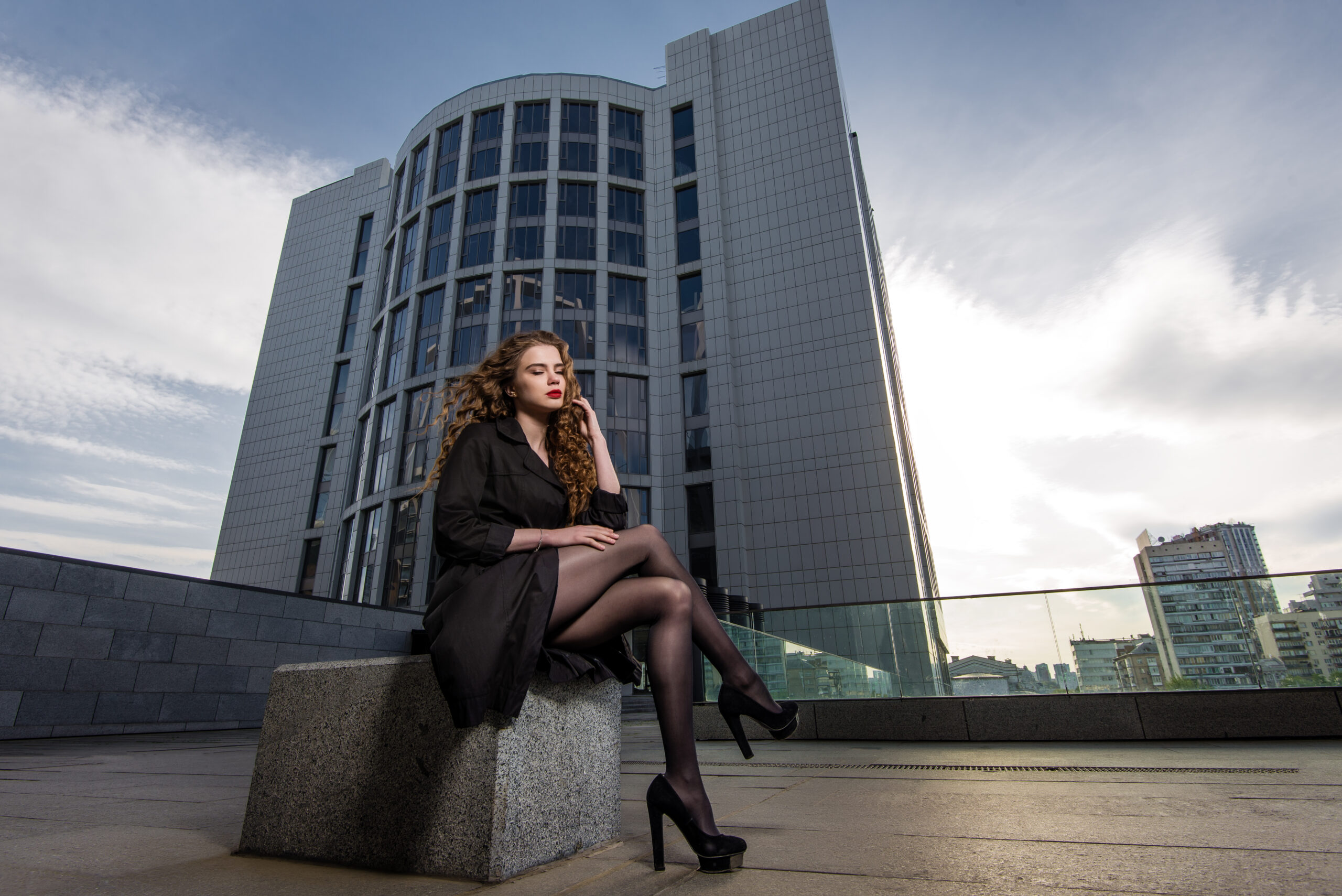 Fashionable brunette woman in modern style, reflecting current trends.